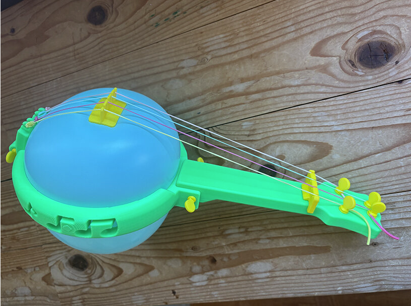 This 3D-Printed Banjo Uses a Party Balloon as Its Sound Box